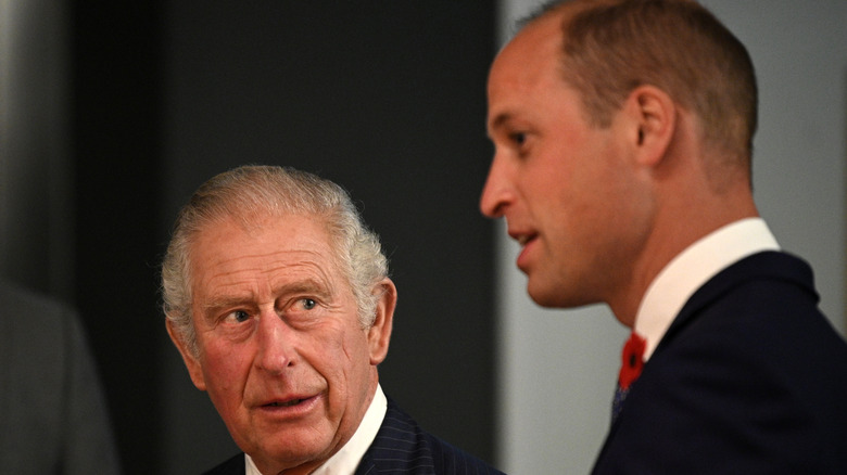 Prince Charles and Prince William at an event. 