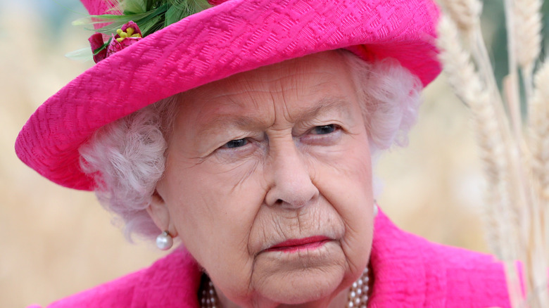 Queen Elizabeth frowning