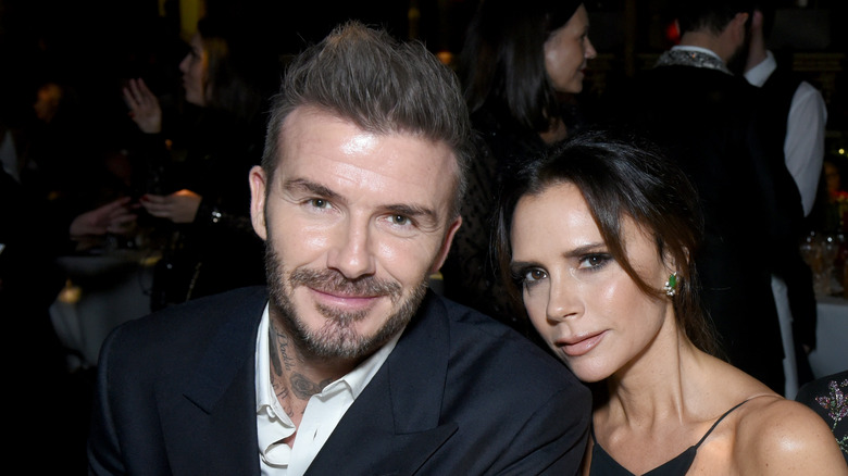 Victoria Beckham and David Beckham posing together