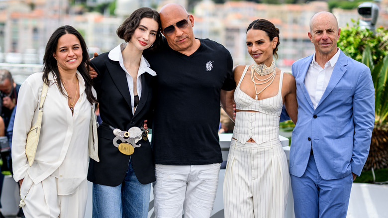 Meadow Walker and Vin Diesel posing for the cameras with a group of people