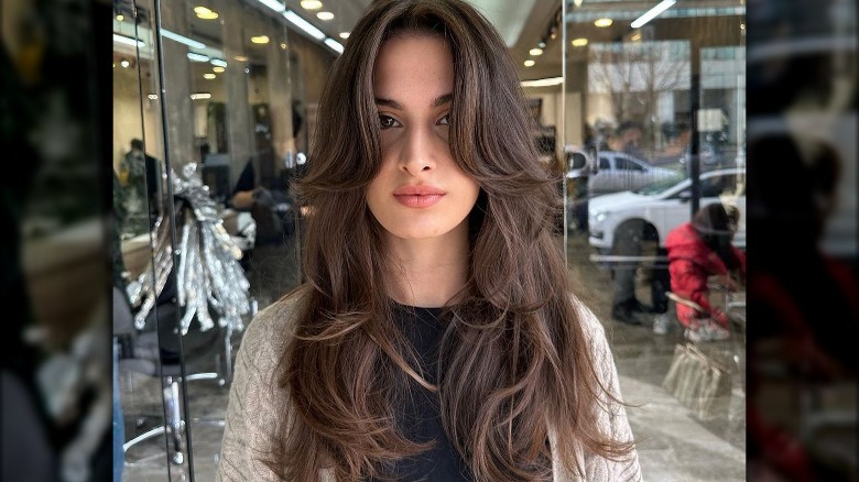 Curtain bangs on brunette