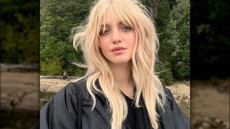 Blonde woman with wolf cut