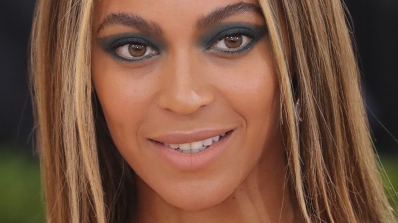 Beyoncé smiling on red carpet