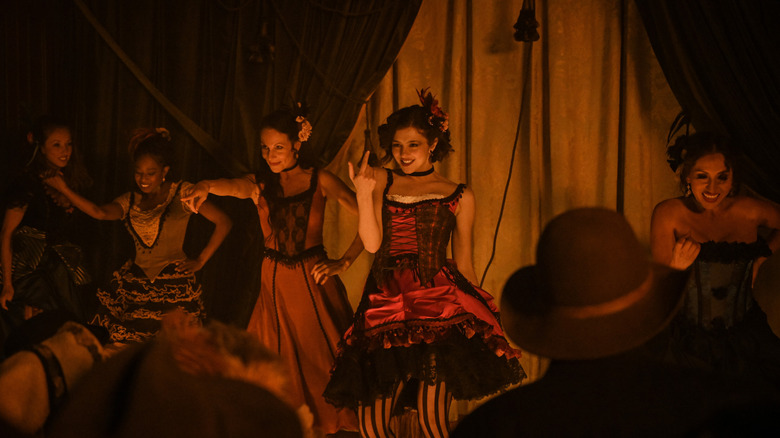 Kate leading white dove on stage