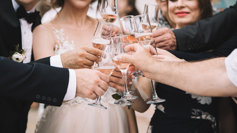 Wedding party wine glass toast