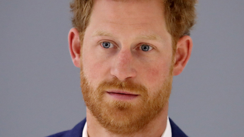 Prince Harry attends an event. 
