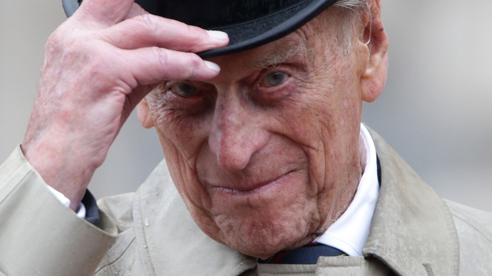 Prince Philip tipping his hat