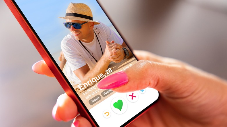 Phone displaying dating profile