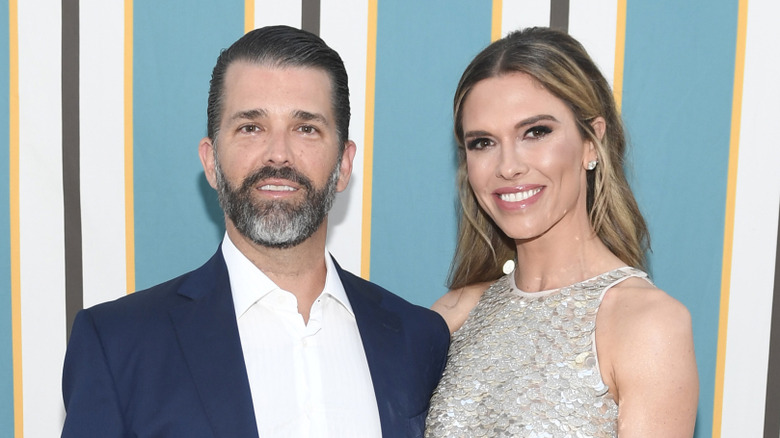 Donald Trump Jr. and Bettina Anderson pose for the camera
