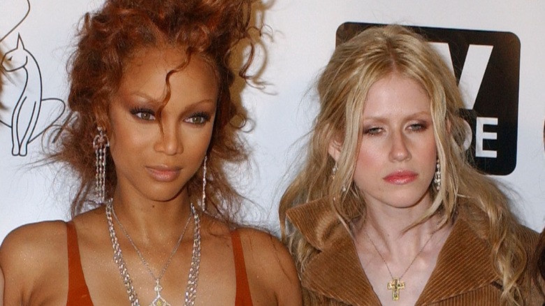 Tyra Banks and Shandi Sullivan posing for a picture