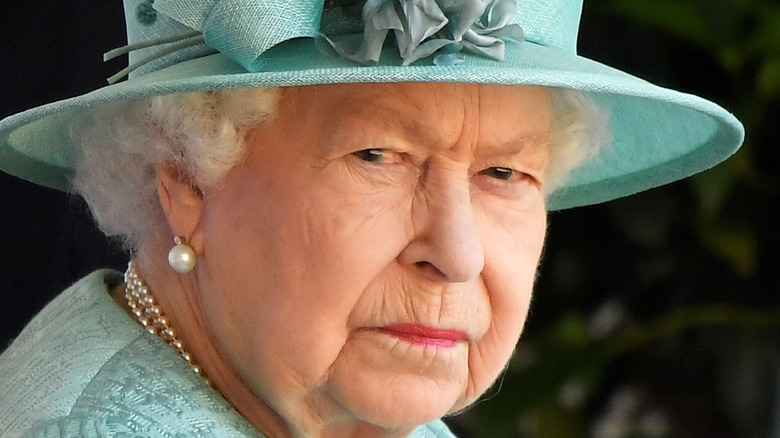 Queen Elizabeth scowling 