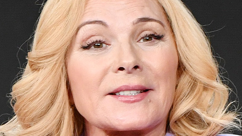 Kim Cattrall smiling eyebrows raised