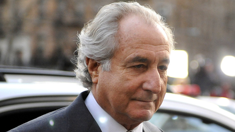 Bernie Madoff in front of a car in New York in 2009