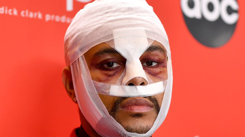 The Weeknd's bandaged face 