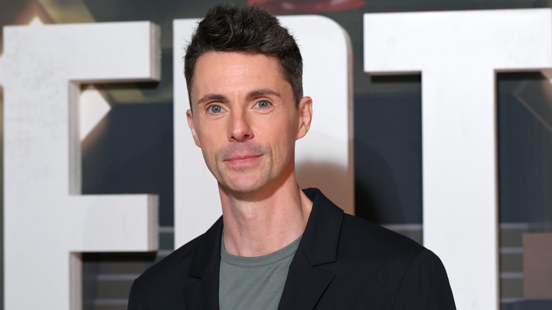 Matthew Goode posing on the red carpet