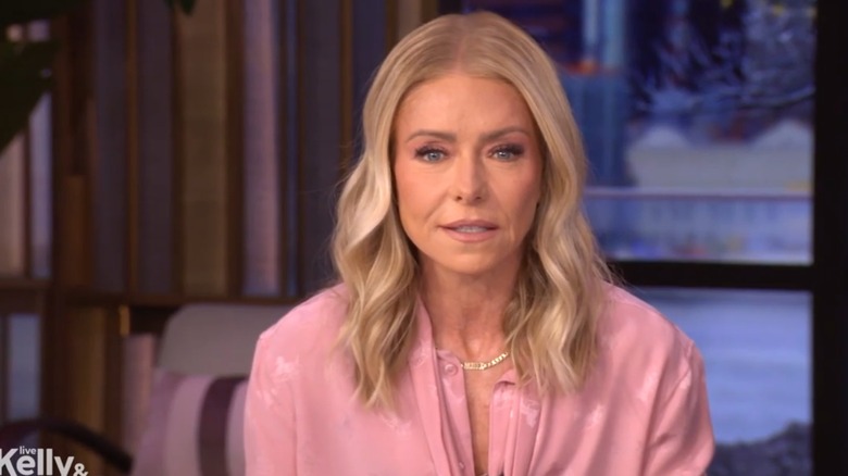 Kelly Ripa looking intently at the camera