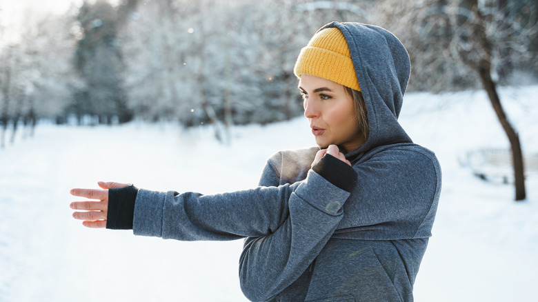 Woman wearing hat during workout