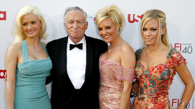 Holly Madison, Hugh Hefner, Bridget Marquardt, and Kendra Wilkinson on the red carpet