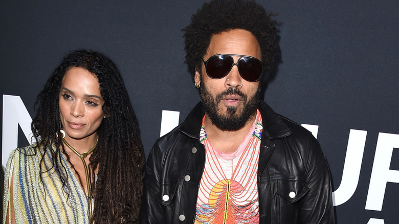 Lisa Bonet and Lenny Kravitz posing at a Saint Laurent show
