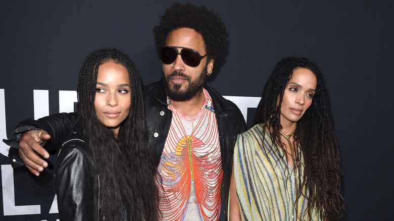 Zoe Kravitz, Lenny Kravitz, and Lisa Bonet attending a Saint Laurent show