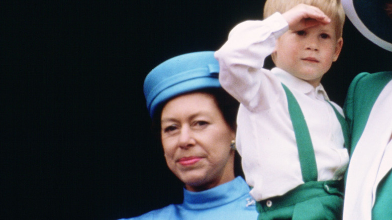 Princess Margaret posing with Prince Harry as a child