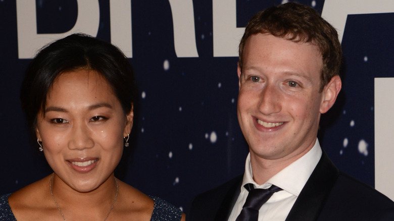 Mark Zuckerberg and Priscilla Chan at a press event