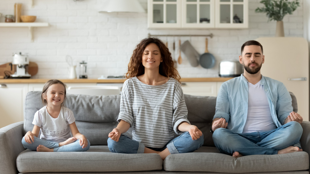 Family meditating together