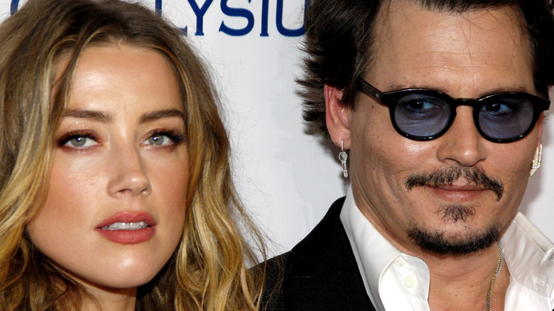 Johnny Depp and Amber Heard at event