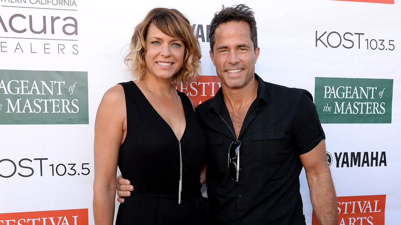 Arianne Zucker and Shawn Christian smiling