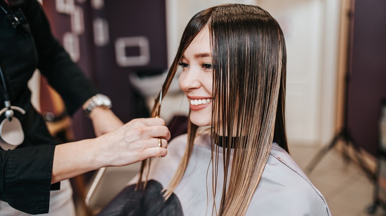 Woman getting a haircut