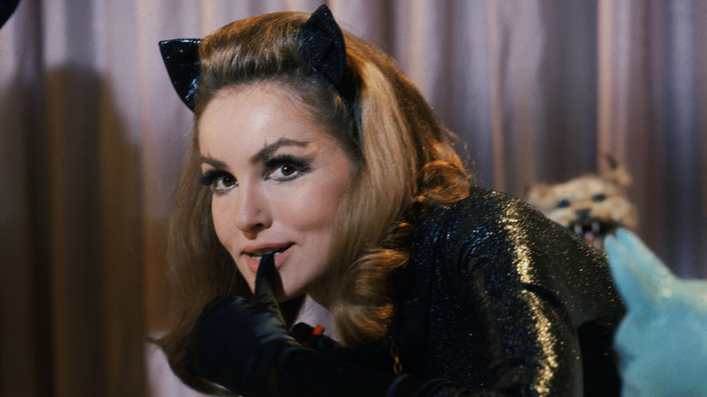 Julie Newmar posing for a photo in her Catwoman costume