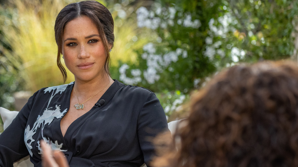 Meghan Markle talking with Oprah