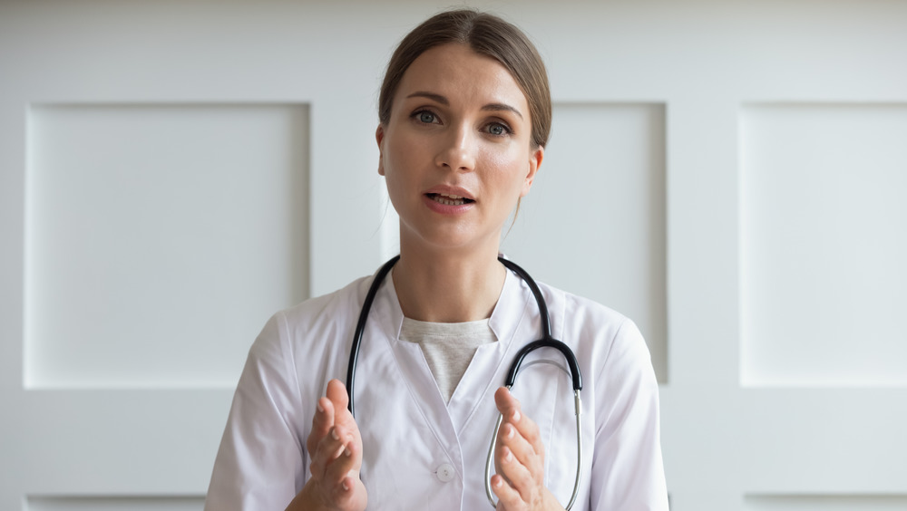 Doctor with stethoscope around neck