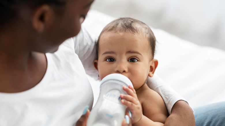 Baby drinking from a bottle