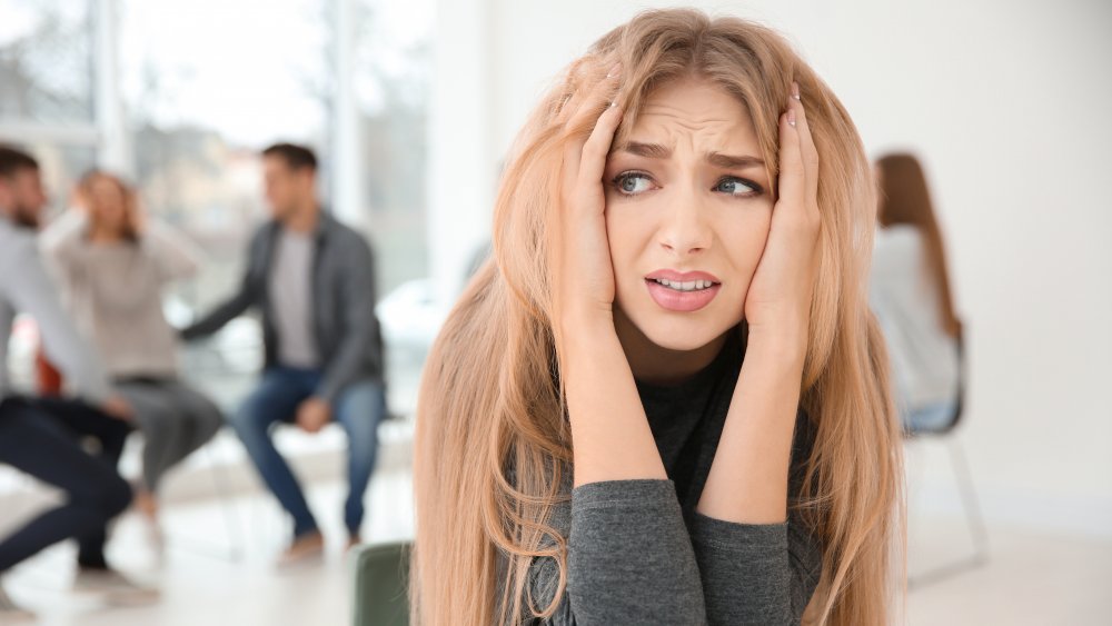 Woman anxious around others