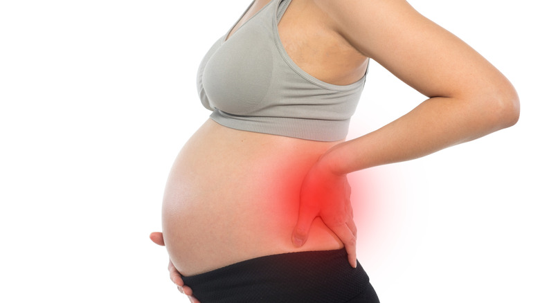 Pregnant belly and back pain