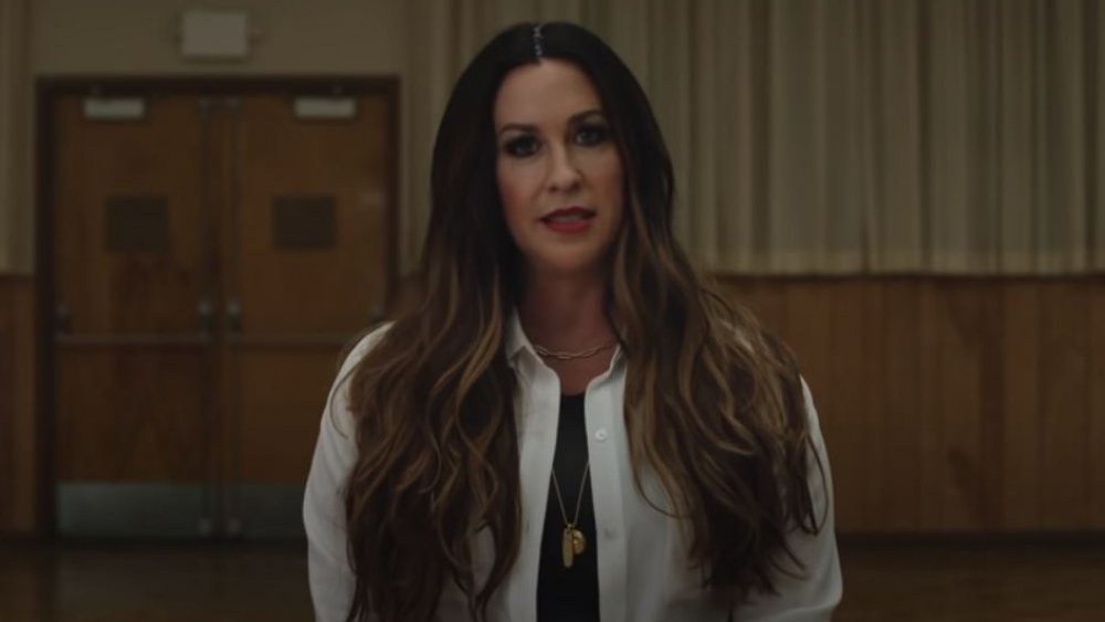 Alanis Morissette in the music video for "Reasons I Drink"