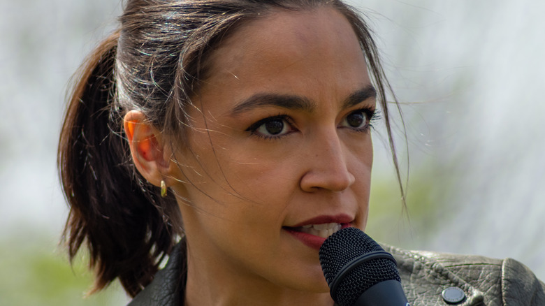 Alexandria Ocasio-Cortez speaking on mic