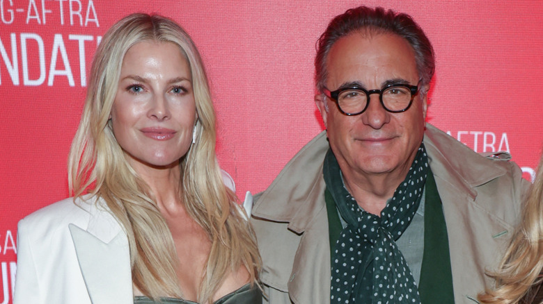 Ali Larter and Andy Garcia posing together at an event