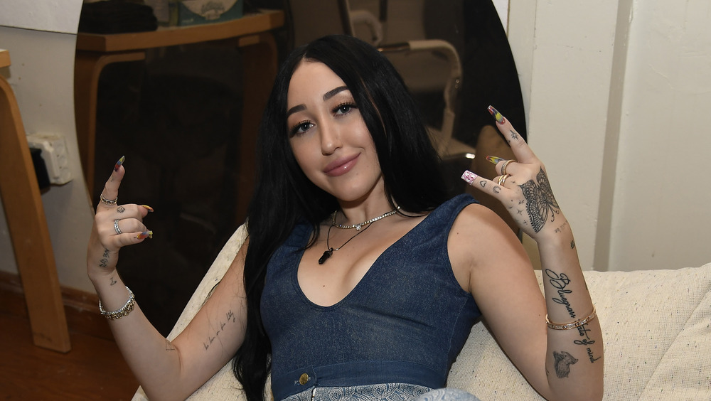 What All Of Noah Cyrus's Tattoos Really Mean