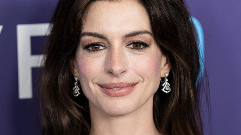 Anne Hathaway wearing dress and shoes by Valentino attends presentation of movie Armageddon Time during 60th New York Film Festival at Alice Tully Hall (2022)