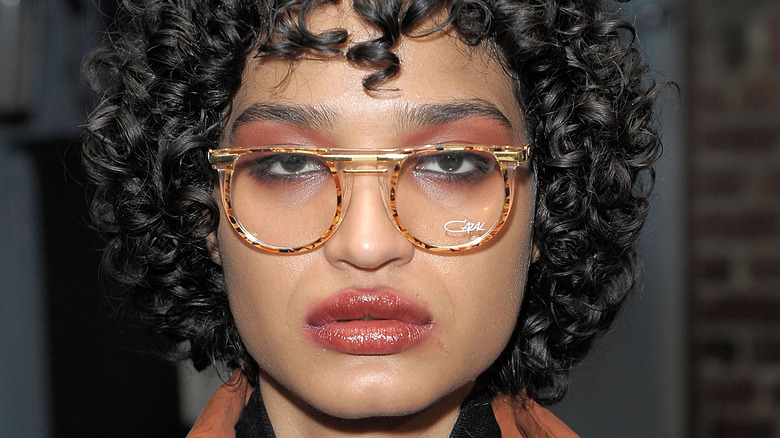 Indya Moore in glasses