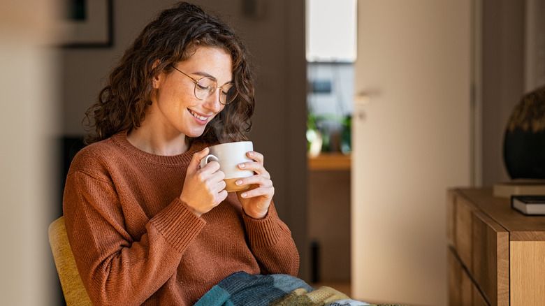 A woman drinking tea