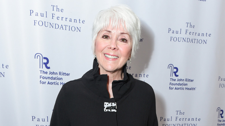 Joyce DeWitt smiling on the red carpet at a charity event for John Ritter's charity foundation
