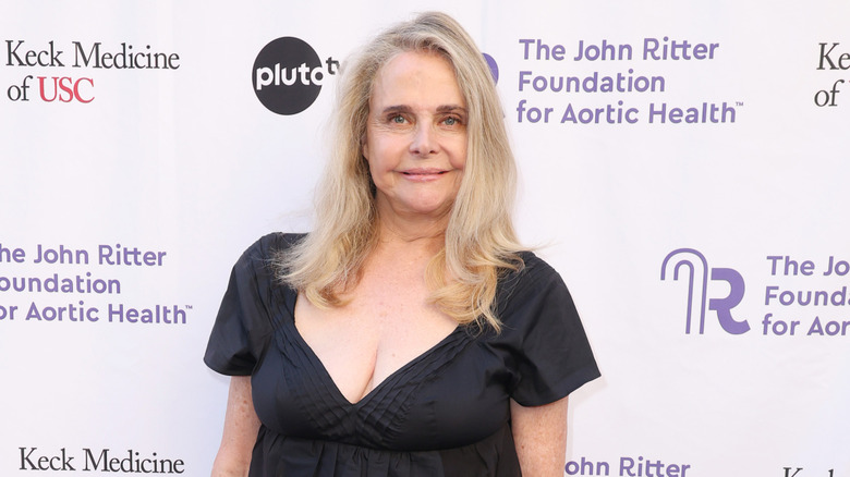 Priscilla Barnes posing at the John Ritter Foundation for Aortic Health charity gala in a black dress