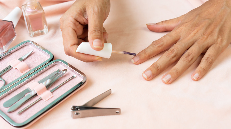 Person painting their nails