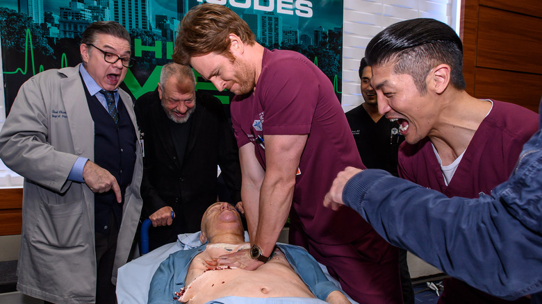 Chicago Med cast doing CPR on a dummy