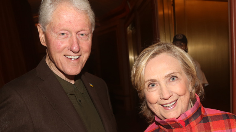 Bill and Hillary Clinton smiling