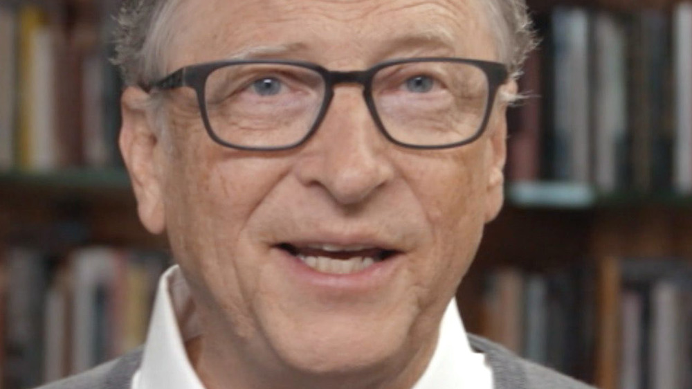 Bill Gates with books in background