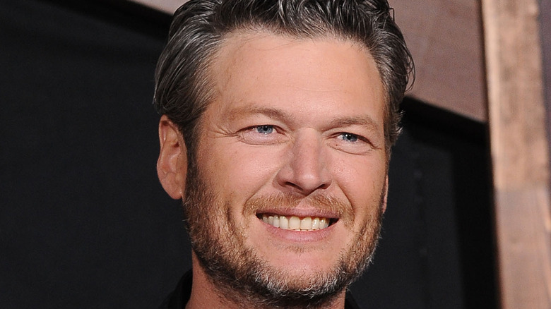 Blake Shelton smiling at film premiere 